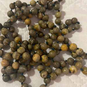 Long Bead Necklace. Green/Brown in color.